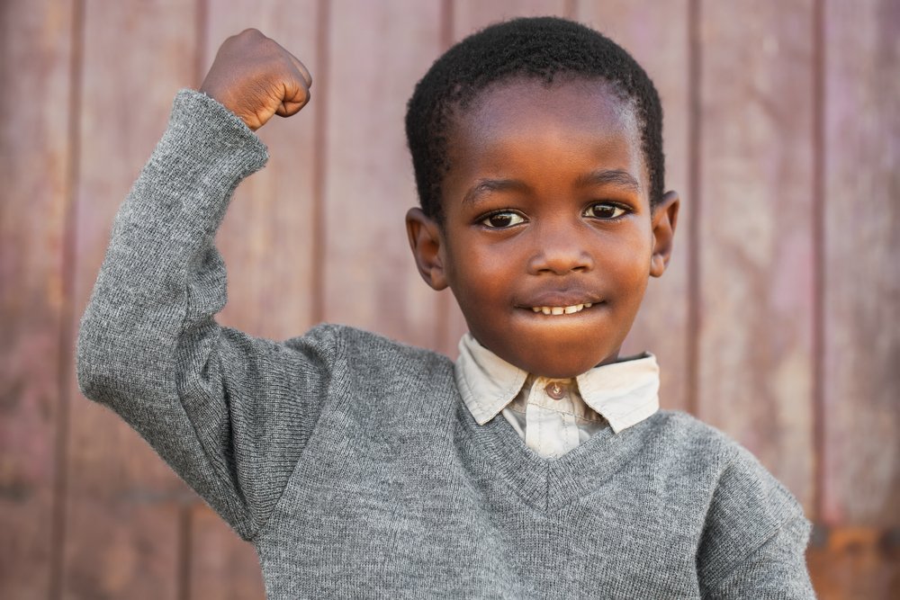 African Boy showing His Power